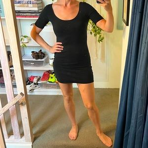 Stretchy black cotton LBD with short sleeves, scoop neck, and scoop back